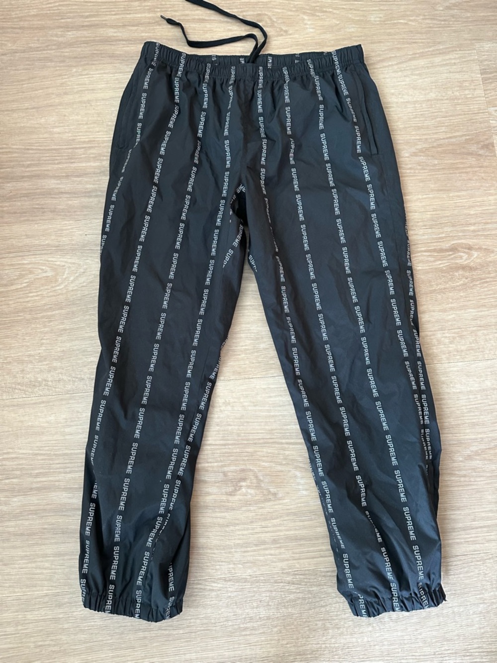 Supreme Black All-Over Logo Joggers